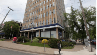 The corner of Quinpool and Robie streets in Halifax: “If the two proposals proceed, we’d get a massive block of towers with more traffic, noise, shadow, wind and a much larger carbon footprint,” say critics. (ERIC WYNNE/Staff)