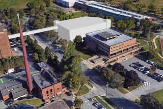This rendering by Marcel Tarnogorski shows the proposed parkade at the Halifax Infirmary site, with the pedway spanning Summer Street. - Contributed